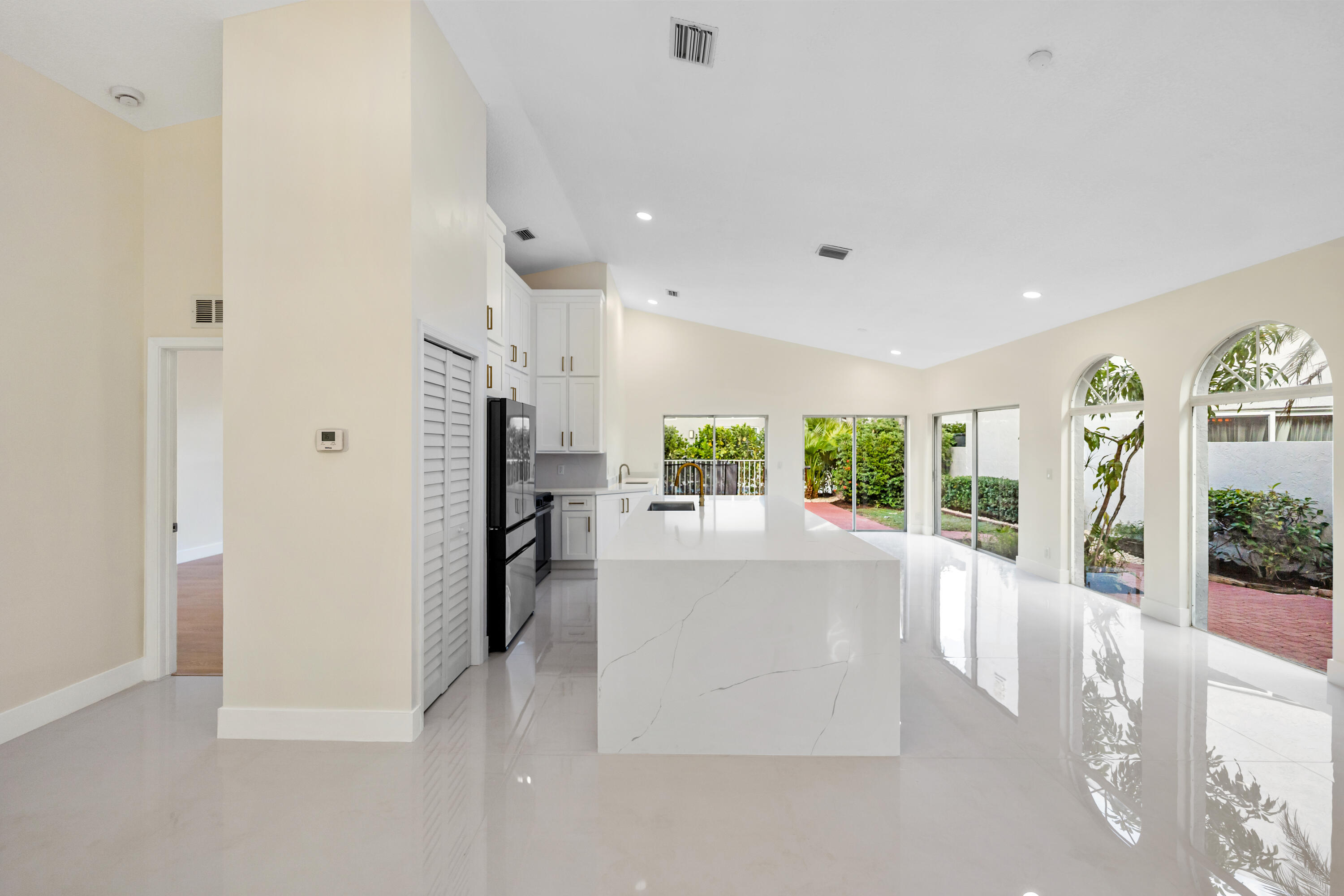 17277 Hampton Boulevard Boca Raton, FL 33496 - Photo 7 of 55 a view of a open shower and a kitchen