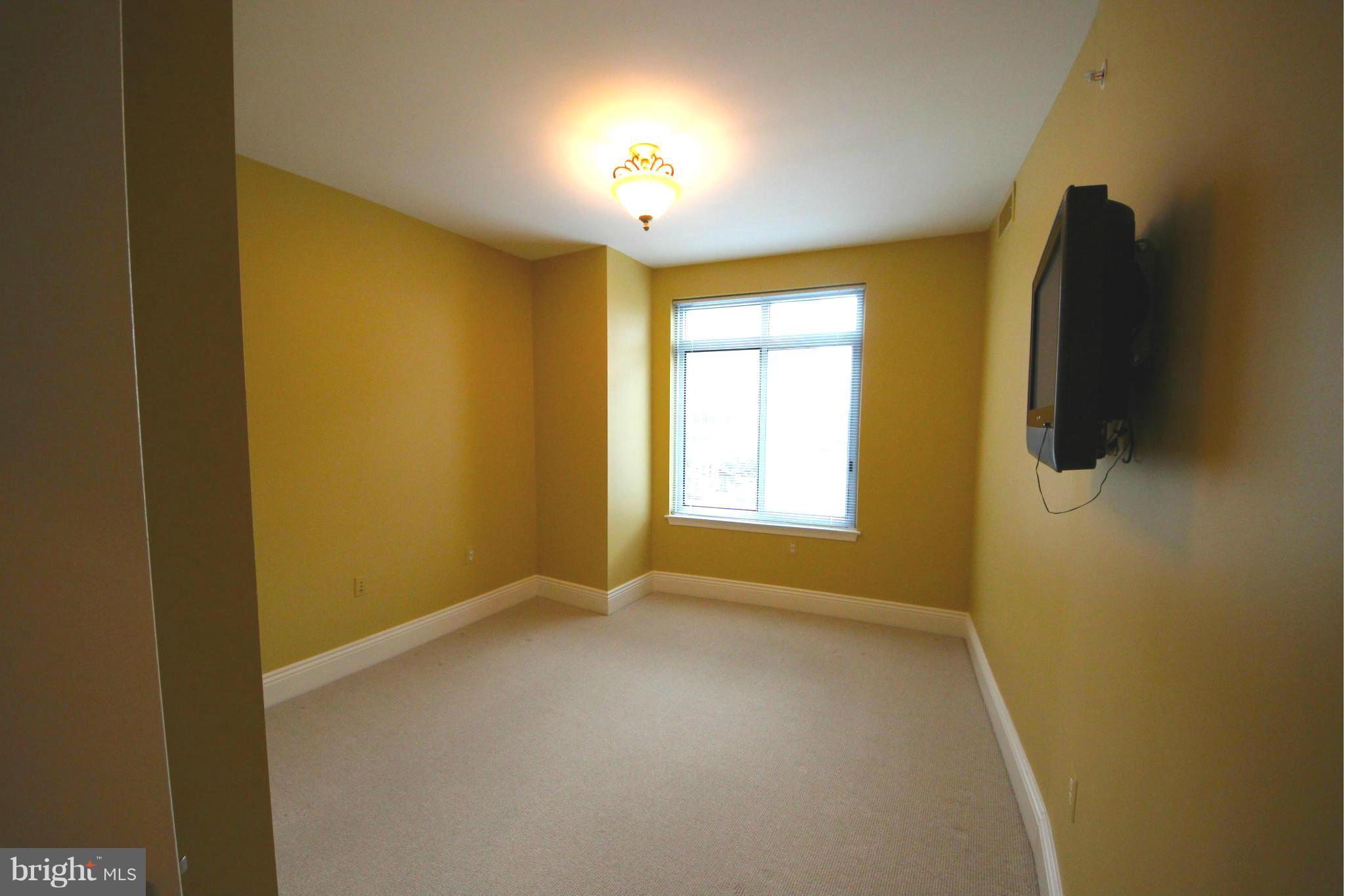 11990 Market Street, Unit 402 Reston, VA 20190 - Photo 23 of 30 Bedroom
