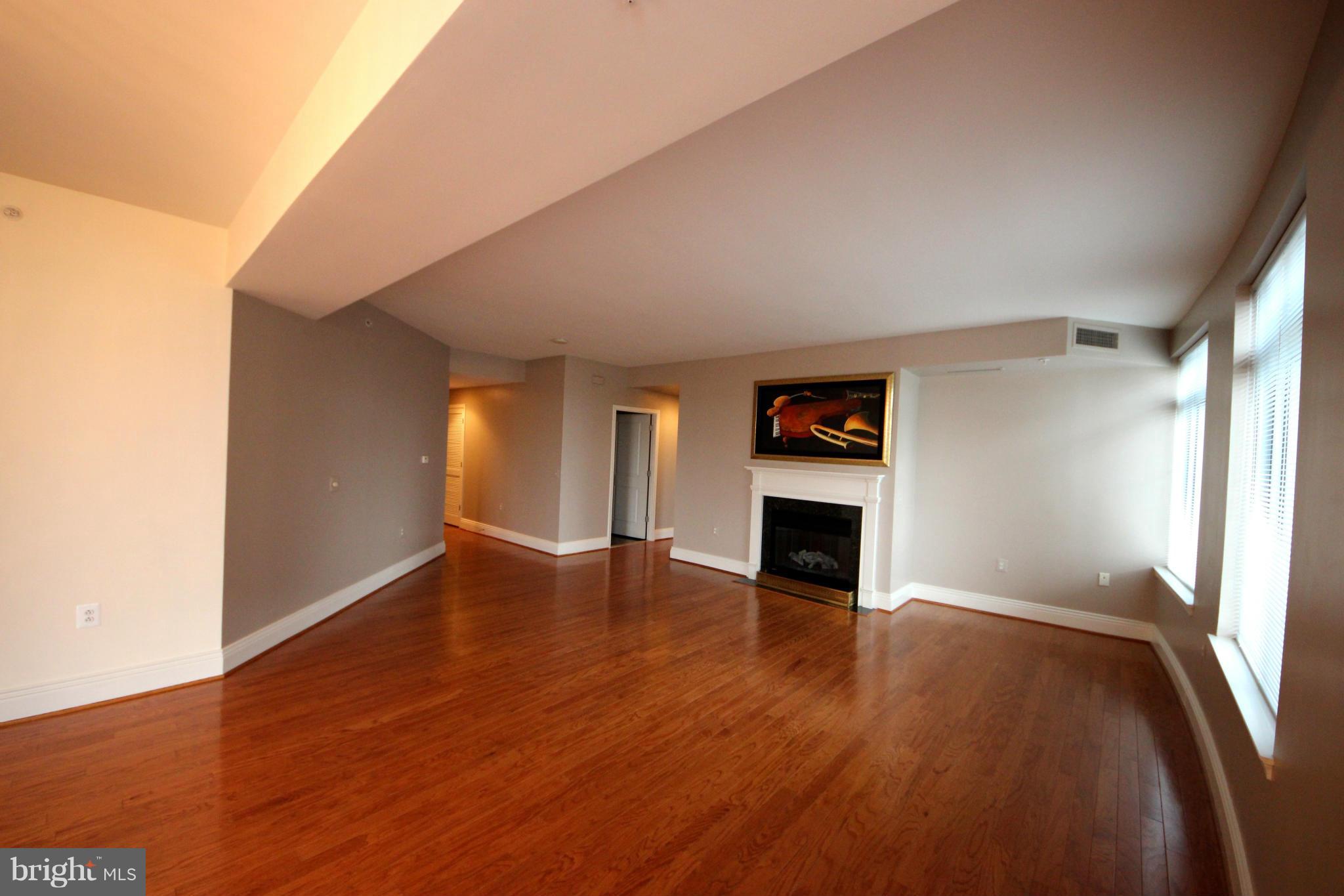 11990 Market Street, Unit 402 Reston, VA 20190 - Photo 9 of 30 Living Room