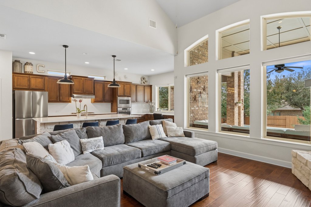 558 Merion Drive Austin, TX 78737 - Photo 17 of 40 a living room with furniture and a large window