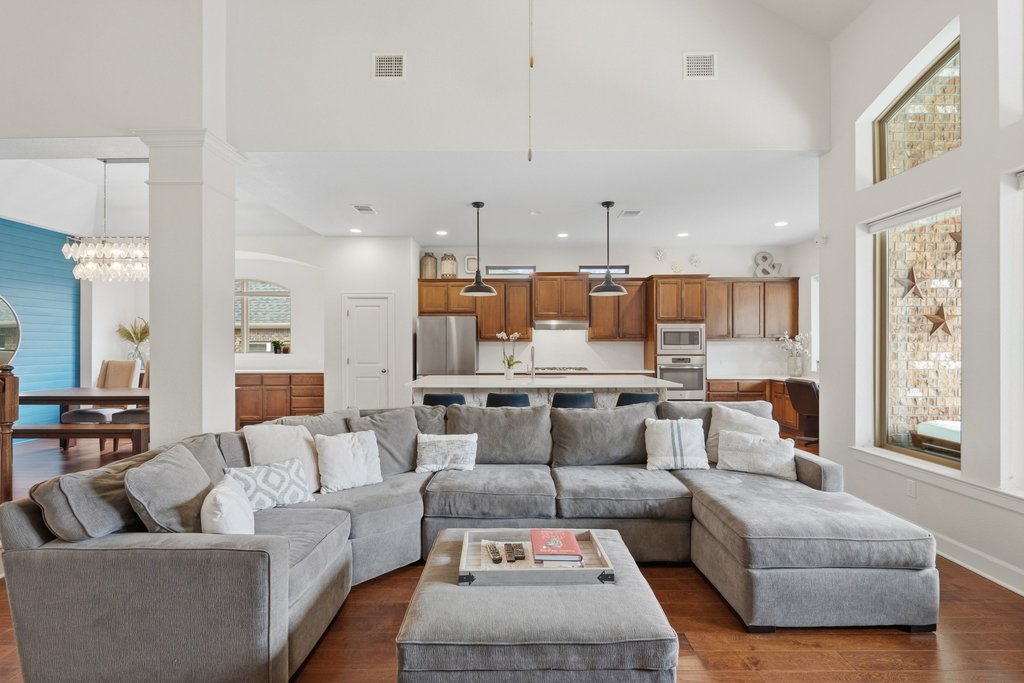 558 Merion Drive Austin, TX 78737 - Photo 18 of 40 a living room with furniture and a large window