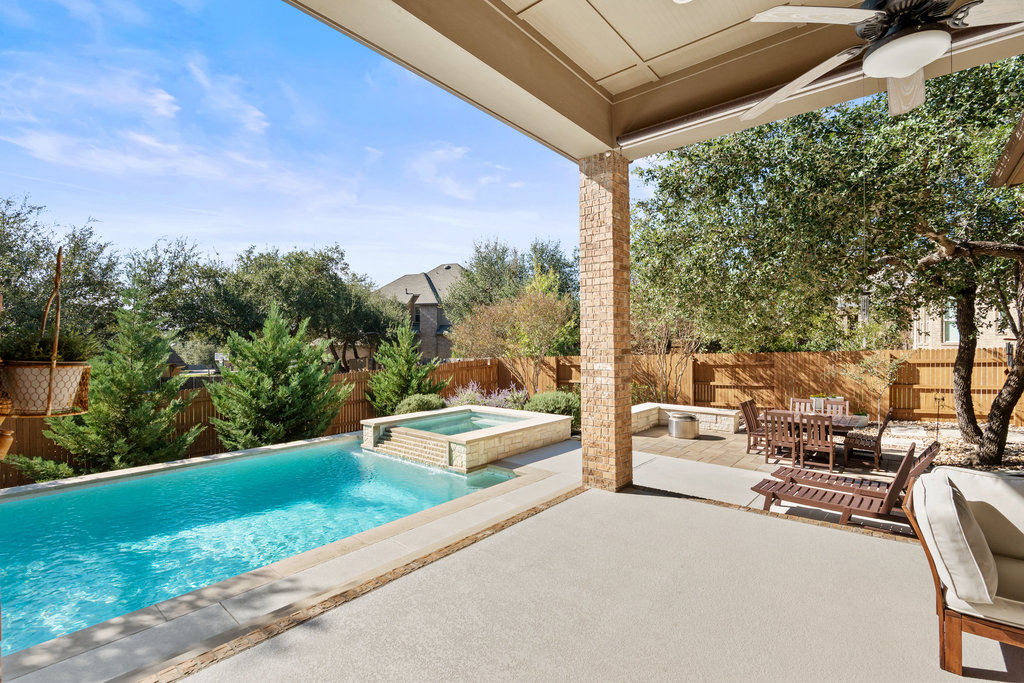 558 Merion Drive Austin, TX 78737 - Photo 31 of 40 a view of a patio with couches and pool