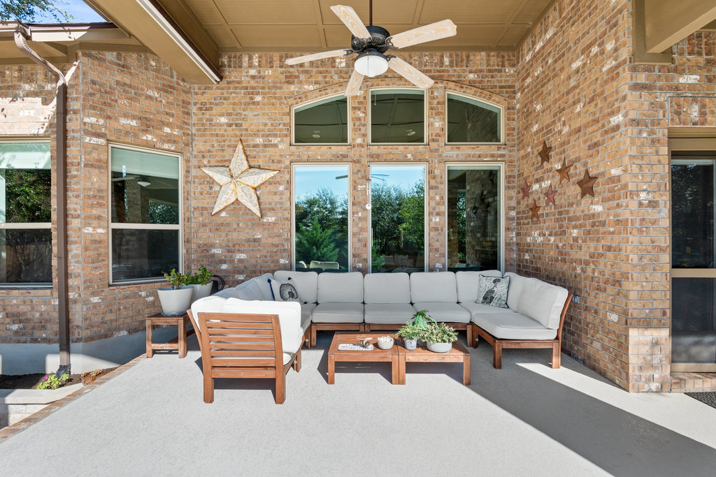 558 Merion Drive Austin, TX 78737 - Photo 32 of 40 a building outdoor space with patio furniture
