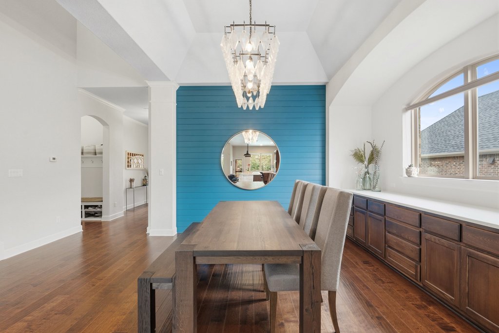 558 Merion Drive Austin, TX 78737 - Photo 9 of 40 a view of a dining room with furniture window and wooden floor
