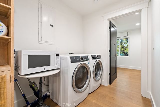 a view of yard with tree in front of it