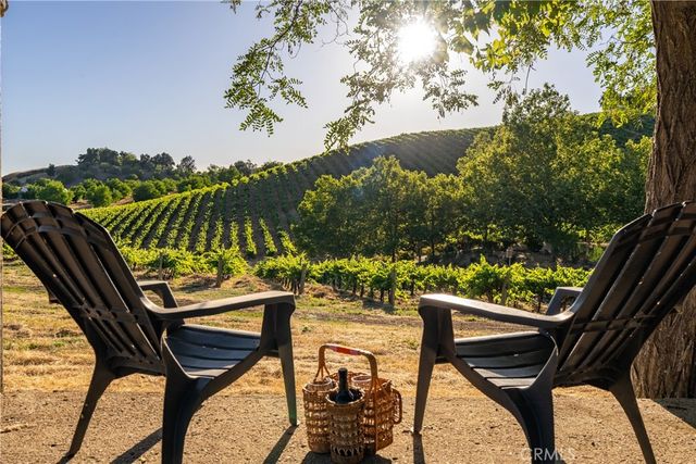 a view of a street with a building in the background