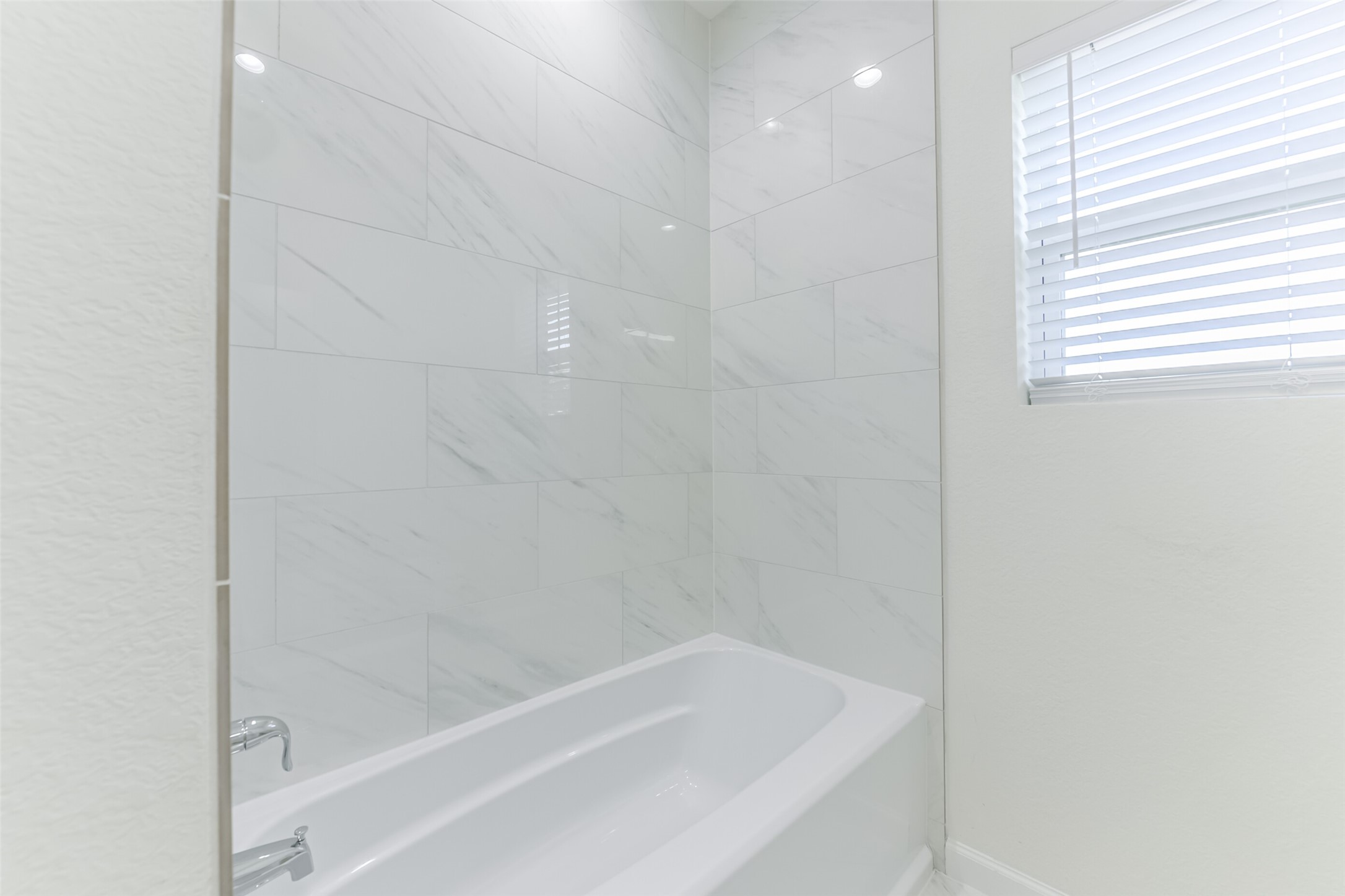4830 Burma Road, Unit A B Houston, TX 77033 - Photo 23 of 34 a close up of a bathtub curtain