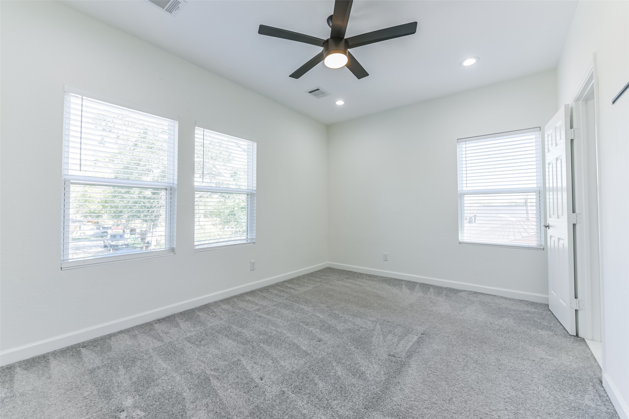 4830 Burma Road, Unit A B Houston, TX 77033 - Photo 28 of 34 a view of an empty room with a window