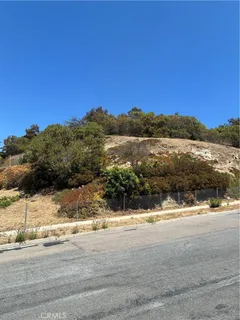 a view of lake with a mountain in the background