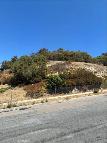 a view of lake with a mountain in the background