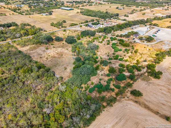 a view of a pathway with a yard