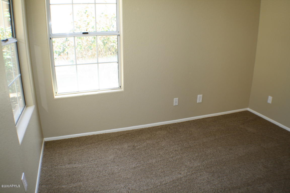 4745 East St John Road Phoenix, AZ 85032 - Photo 12 of 20 an empty room with a window