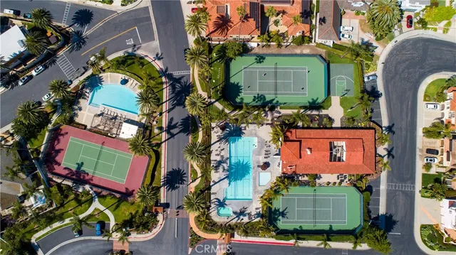 a view of a swimming pool with a lounge chairs