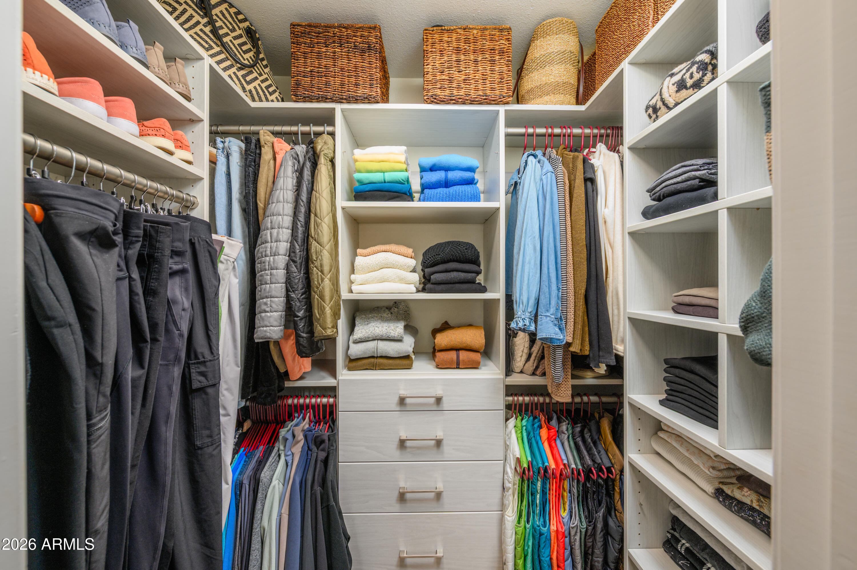 190 Creek Rock Road Sedona, AZ 86351 - Photo 21 of 41 a view of walk in closet with clothes and shoes
