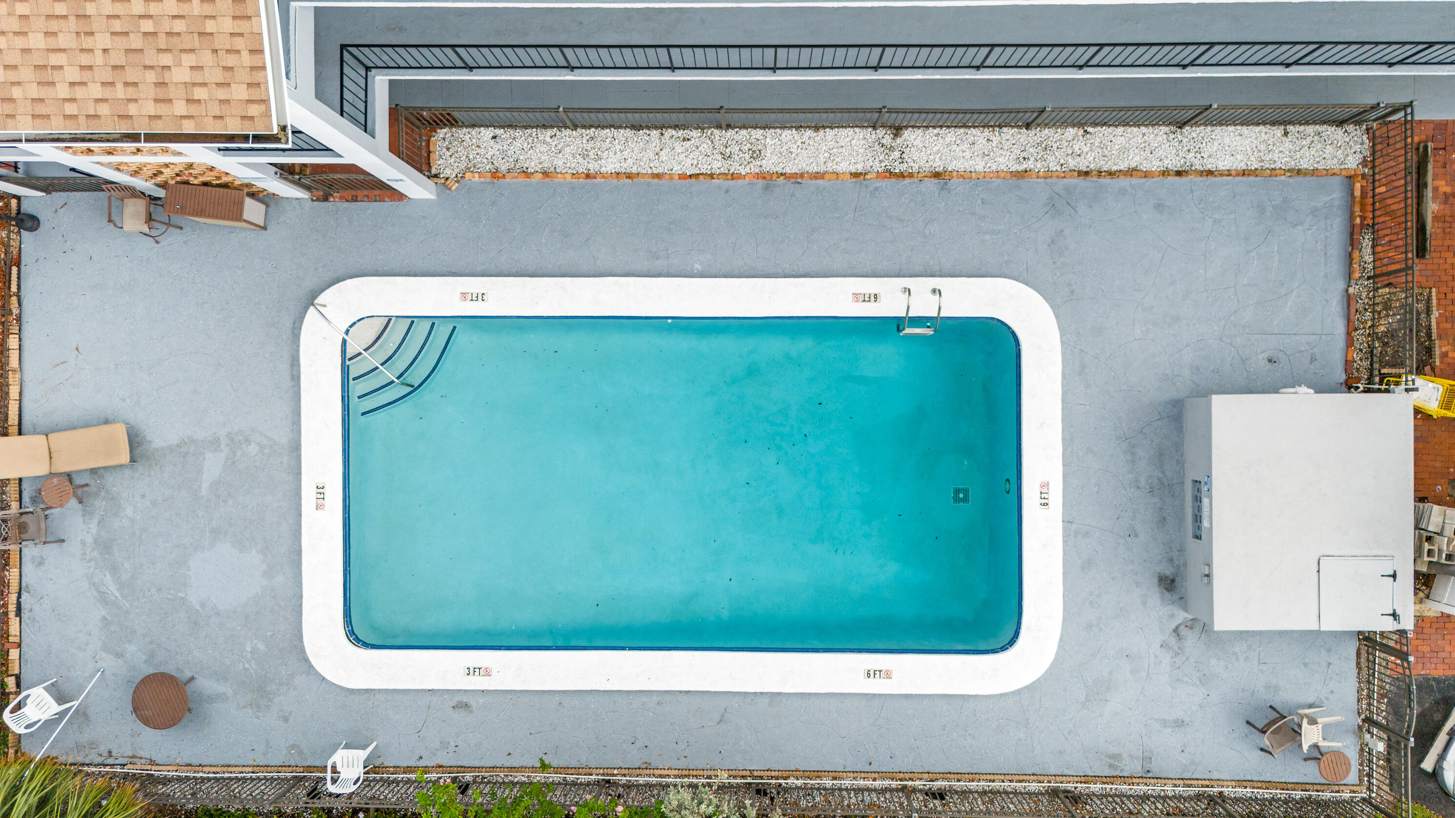 1021 Northeast 24th Avenue, Unit 12 Pompano Beach, FL 33062 - Photo 2 of 33 a bathroom with a sink and mirror
