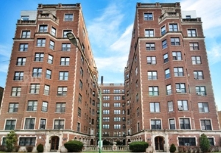 6937 South Crandon Avenue, Unit 4E Chicago, IL 60649 - Photo 1 of 11 front view of a building