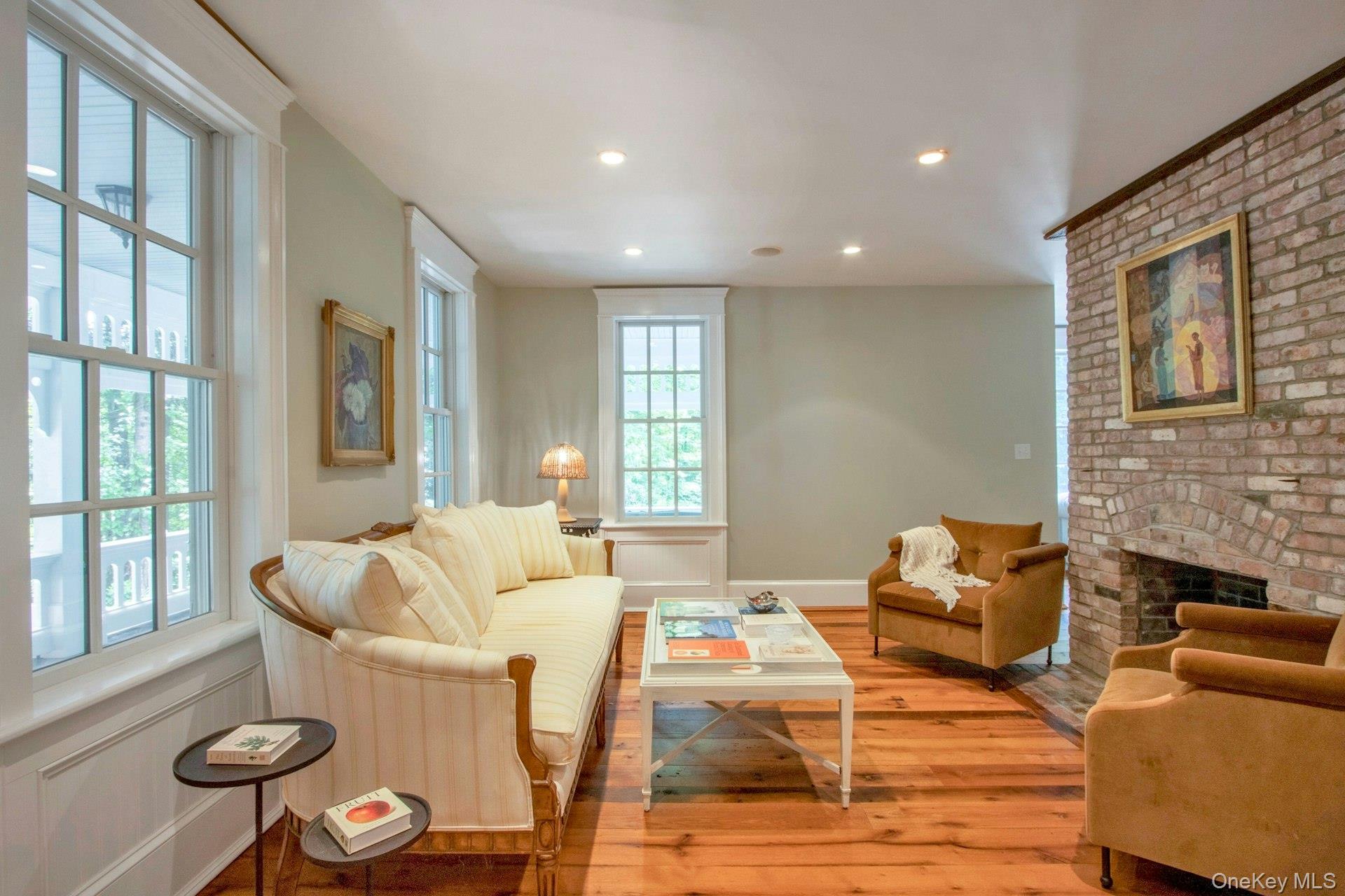 314 Haverstraw Road Suffern, NY 10901 - Photo 6 of 44 Living area with hardwood / wood-style flooring, a brick fireplace, and recessed lighting