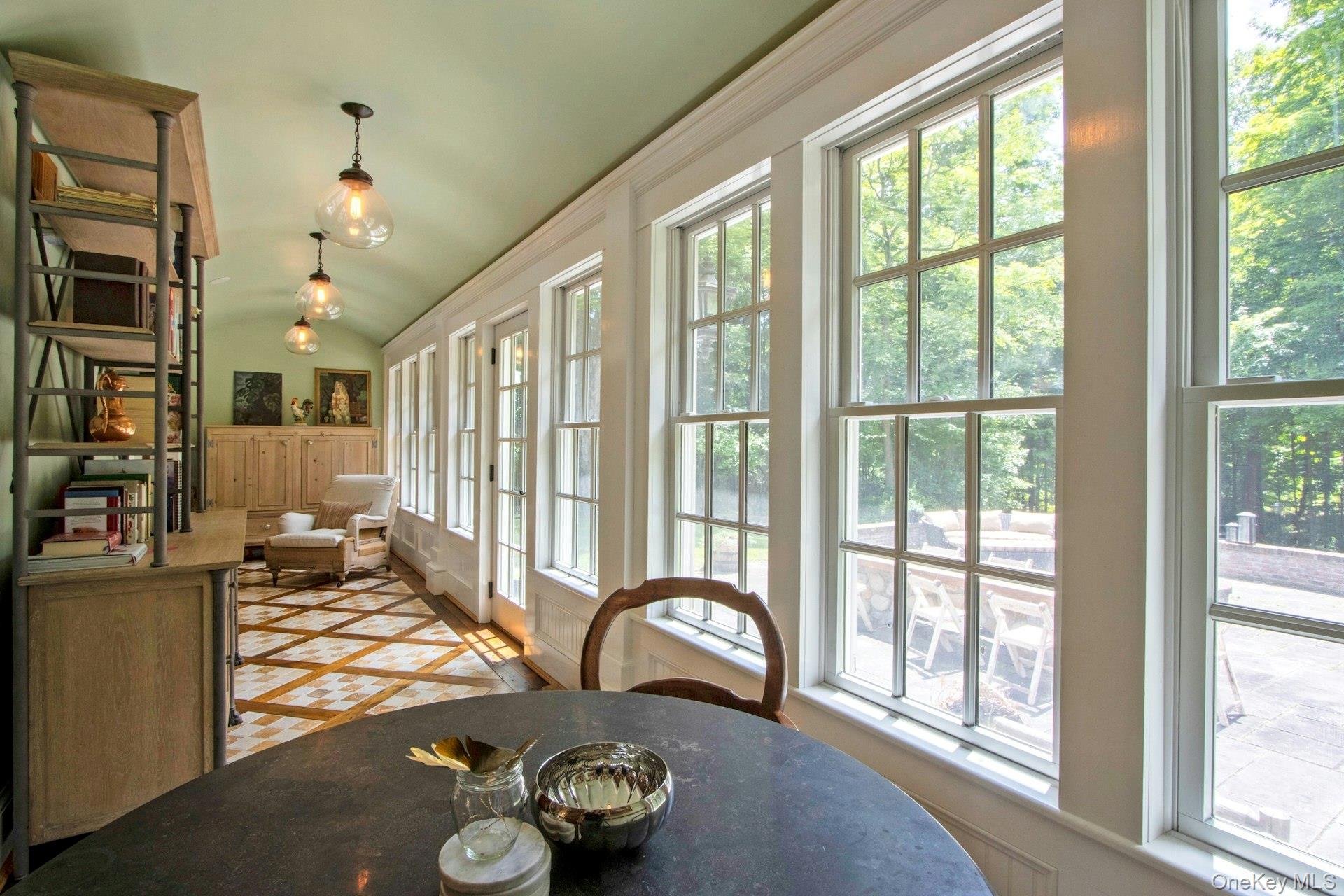 314 Haverstraw Road Suffern, NY 10901 - Photo 10 of 44 Dining space with healthy amount of natural light, vaulted ceiling, and inlaid floor details