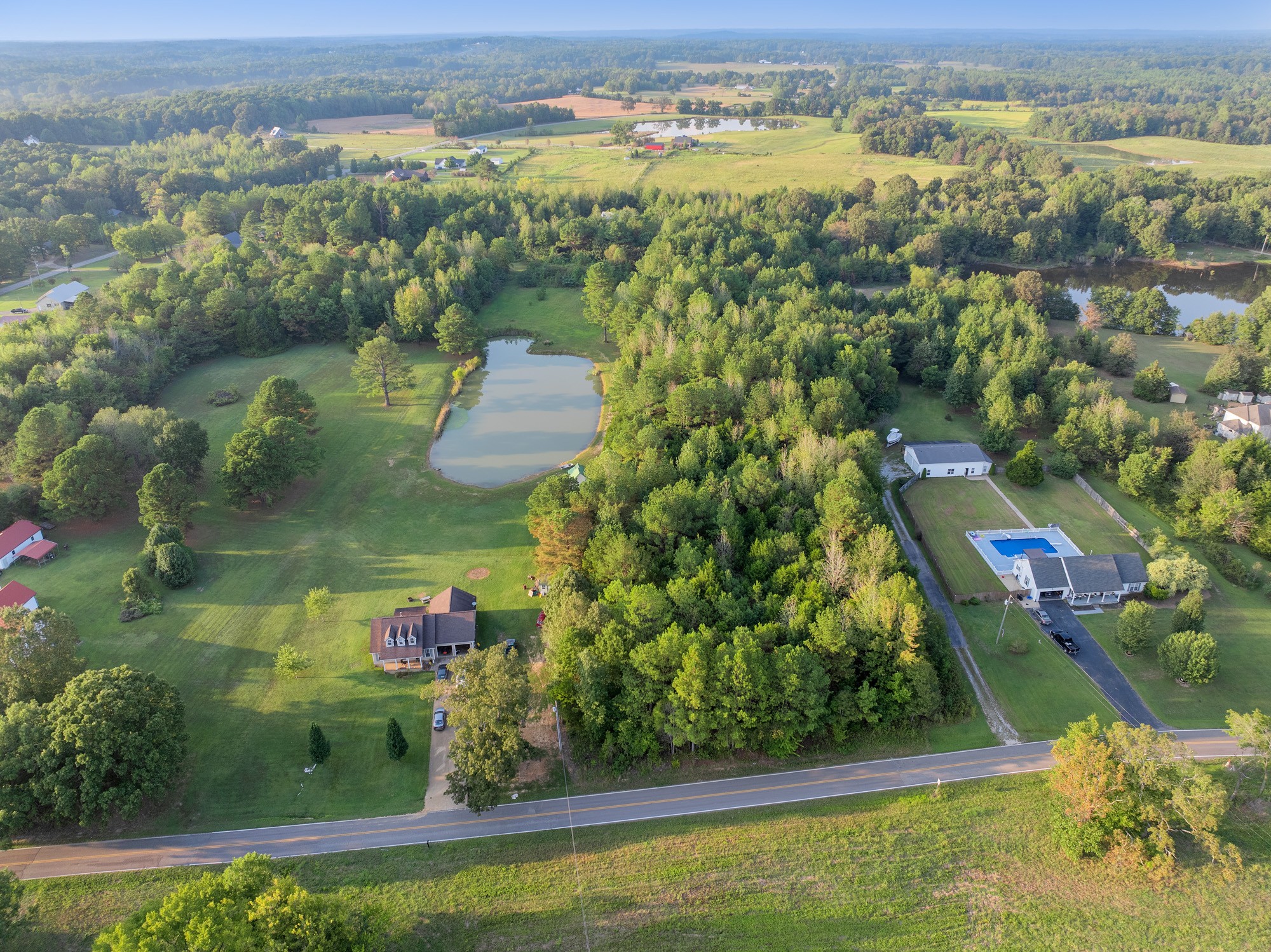 0 Sand Ridge Road Huron, TN 38345 - Photo 5 of 11 an aerial view of residential houses with outdoor space
