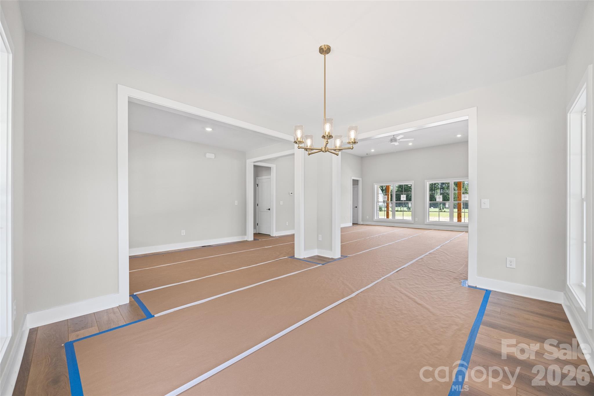640 Edwards Road Fort Lawn, SC 29714 - Photo 12 of 39 a view of a livingroom with a furniture wooden floor and chandelier