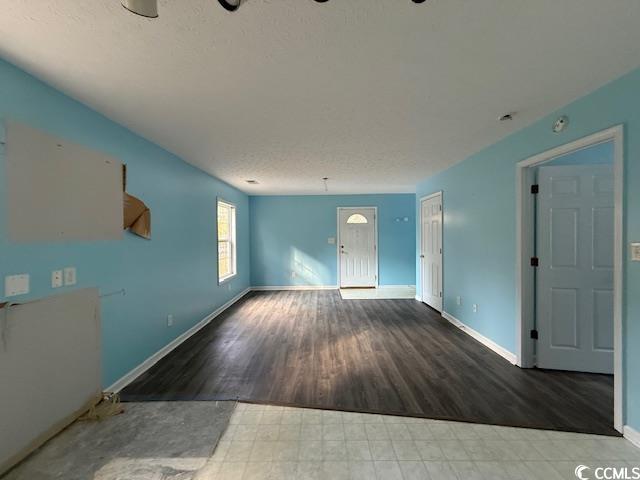 983 Nottingham Lakes Road Conway, SC 29526 - Photo 22 of 27 Spare room with wood finished floors and baseboards