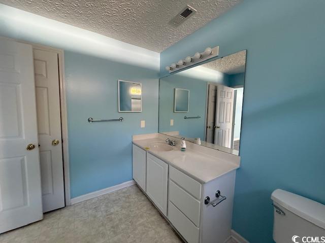 983 Nottingham Lakes Road Conway, SC 29526 - Photo 23 of 27 Bathroom with a textured ceiling and vanity