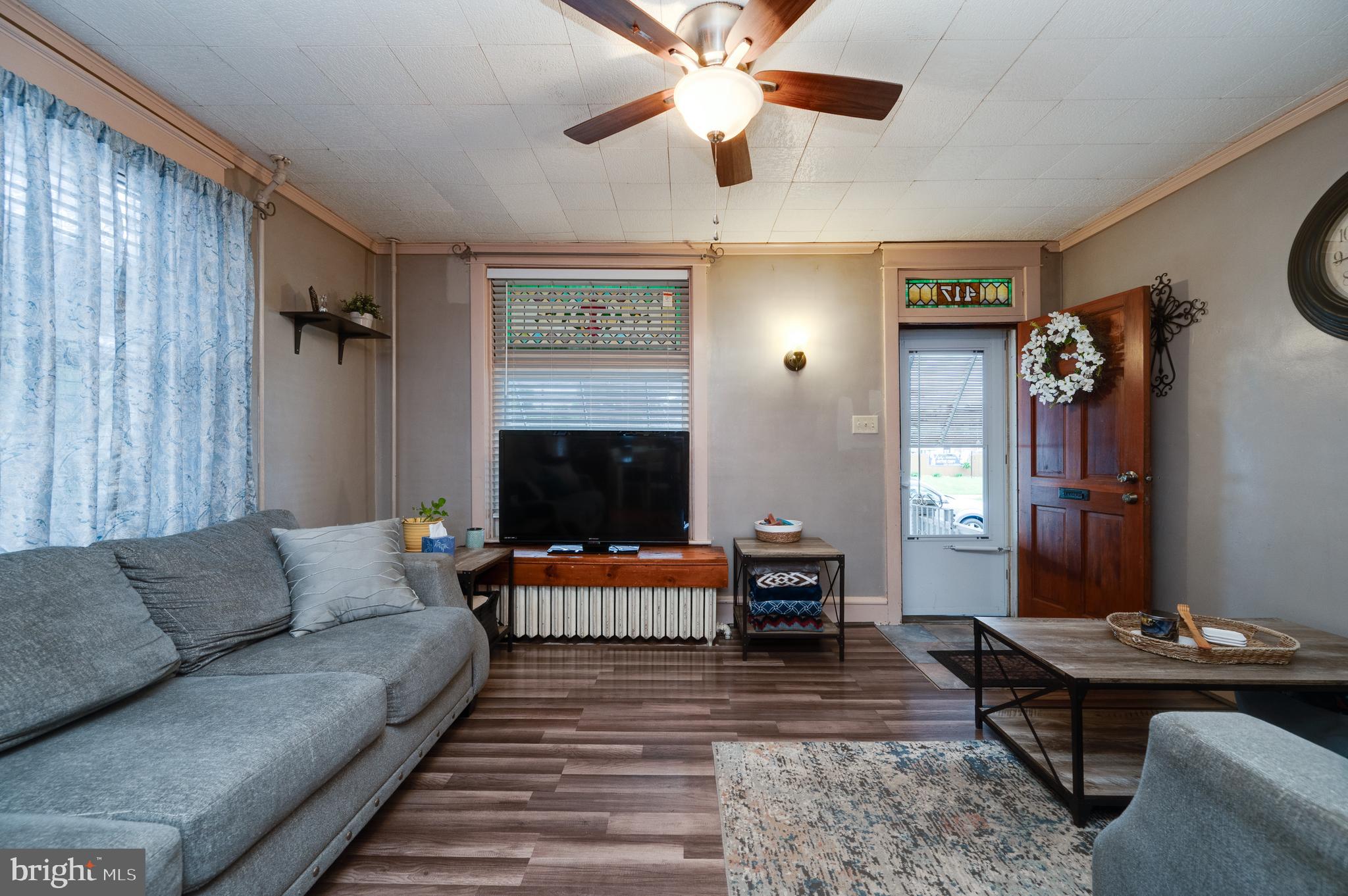 417 North Brobst Street Shillington, PA 19607 - Photo 3 of 24 Cozy living room with vinyl flooring