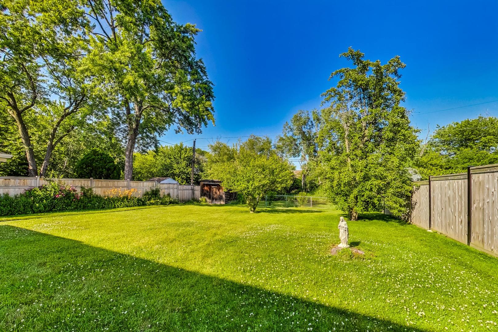 157 Riverside Drive Northfield, IL 60093 - Photo 20 of 21 a view of a playground with a house