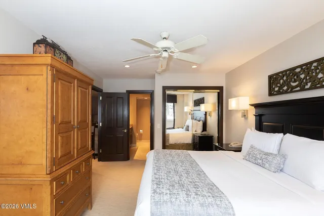 a bathroom with a granite countertop sink mirror and double