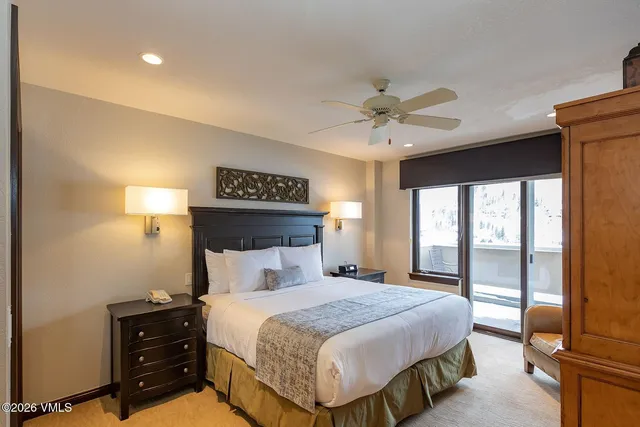 a front view of a building with parking space