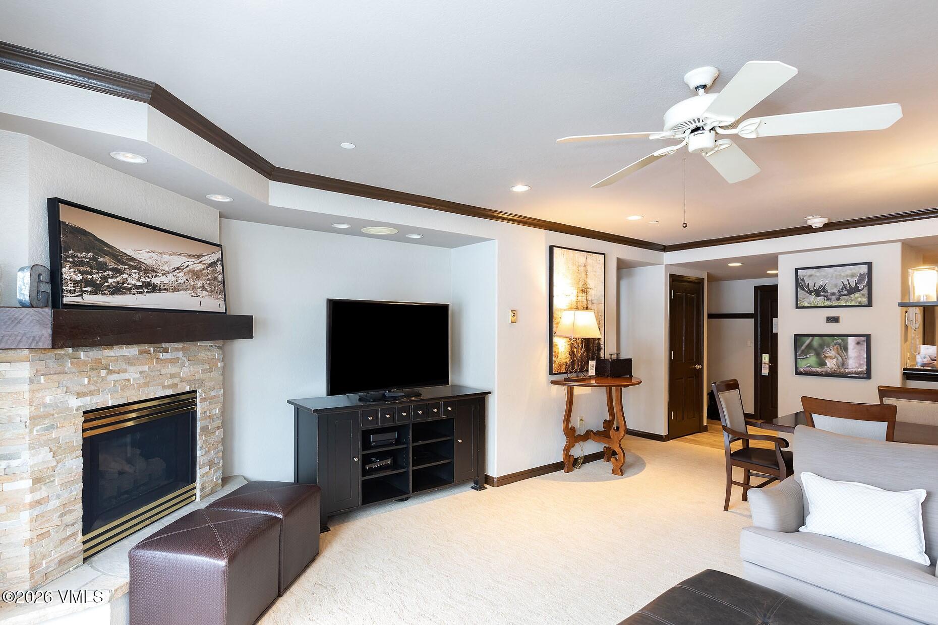 210 Offerson Road, Unit R305 WEEK 14 Beaver Creek, CO 81620 - Photo 2 of 24 a living room with furniture and a flat screen tv