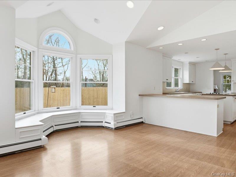 12 Summit Boulevard Westhampton, NY 11977 - Photo 7 of 17 a view of an empty room with a window