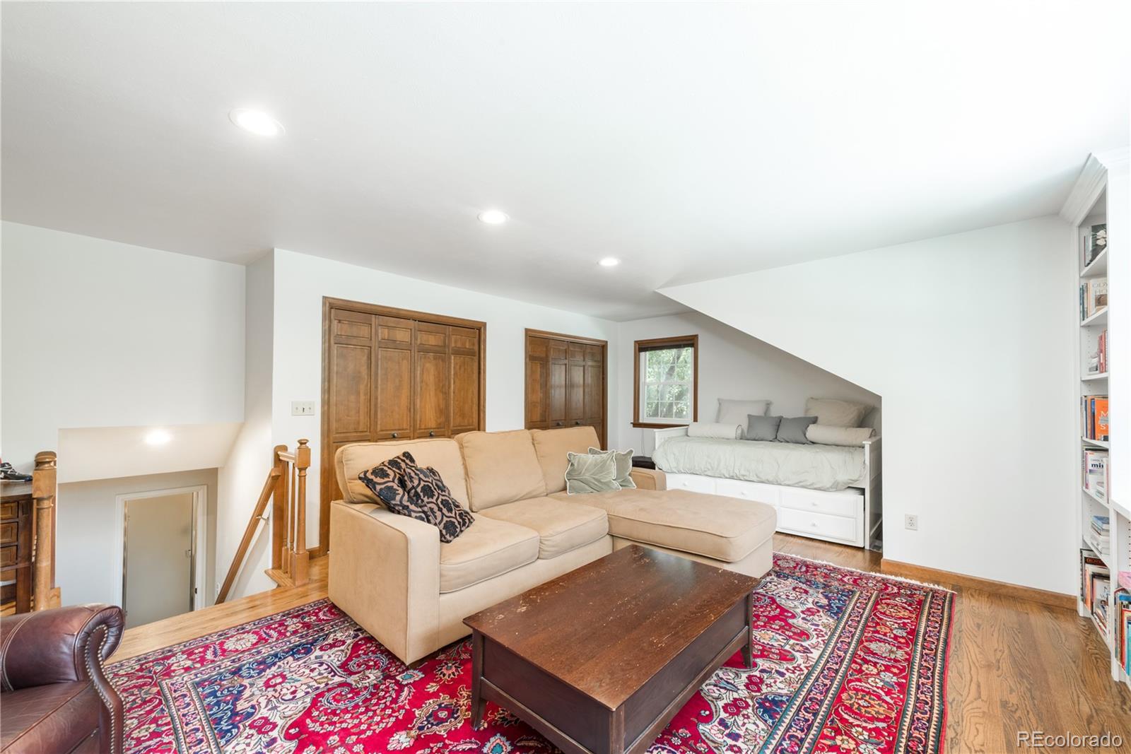 7 Middlefield Road Littleton, CO 80123 - Photo 21 of 39 a living room with furniture and a couch