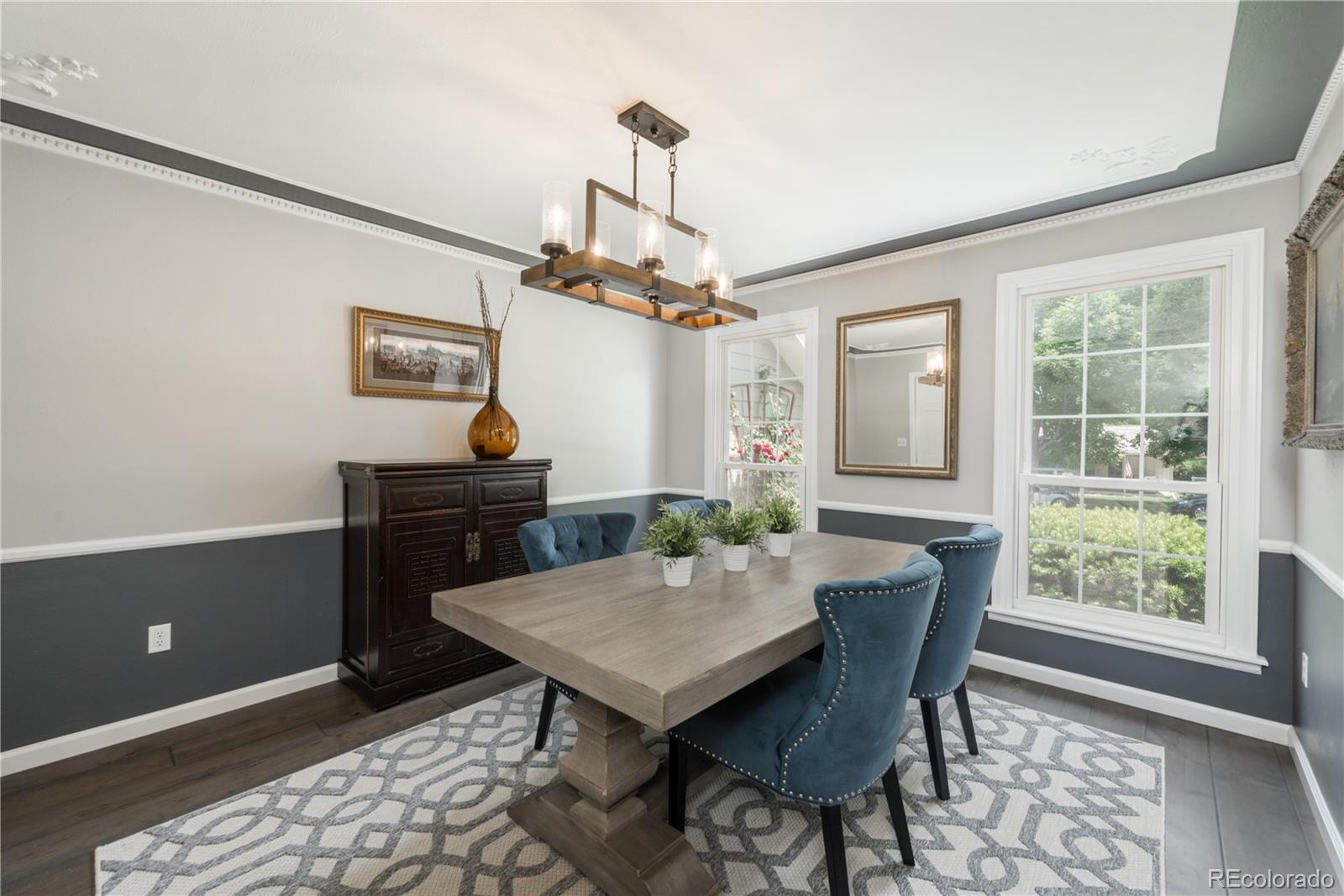 7 Middlefield Road Littleton, CO 80123 - Photo 10 of 39 a dining room with a table and chairs