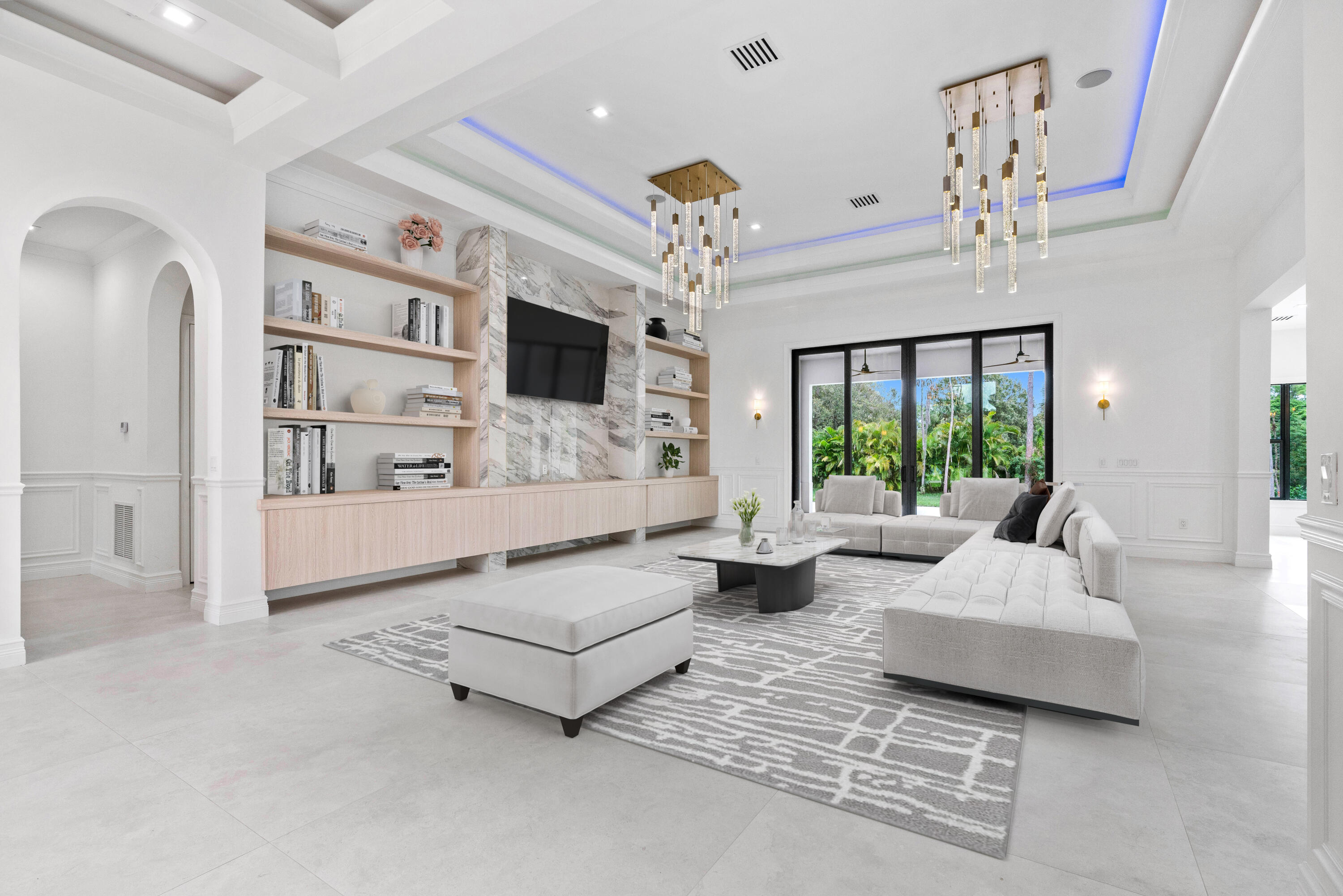 17794 Mellen Lane Jupiter, FL 33478 - Photo 10 of 45 a living room with furniture and a flat screen tv