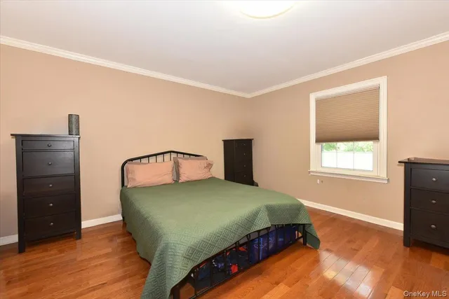 a bedroom with a bed and a closet