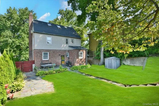 a view of a couches in a backyard of the house