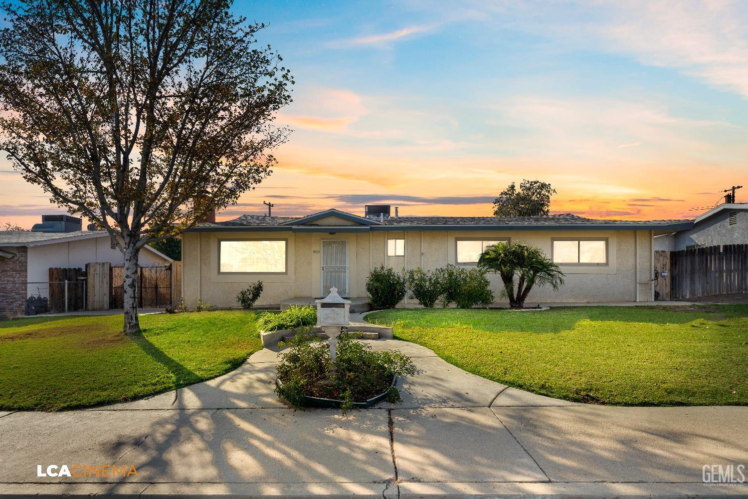 Undisclosed Address Bakersfield, CA 93306 - Photo 1 of 20 a view of a house with a yard