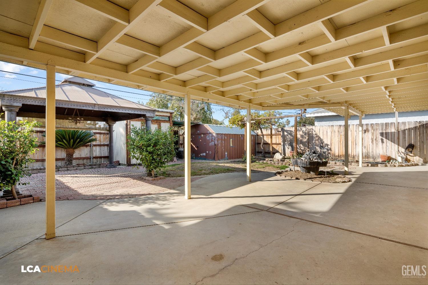Undisclosed Address Bakersfield, CA 93306 - Photo 17 of 20 a view of a hall with wooden floor