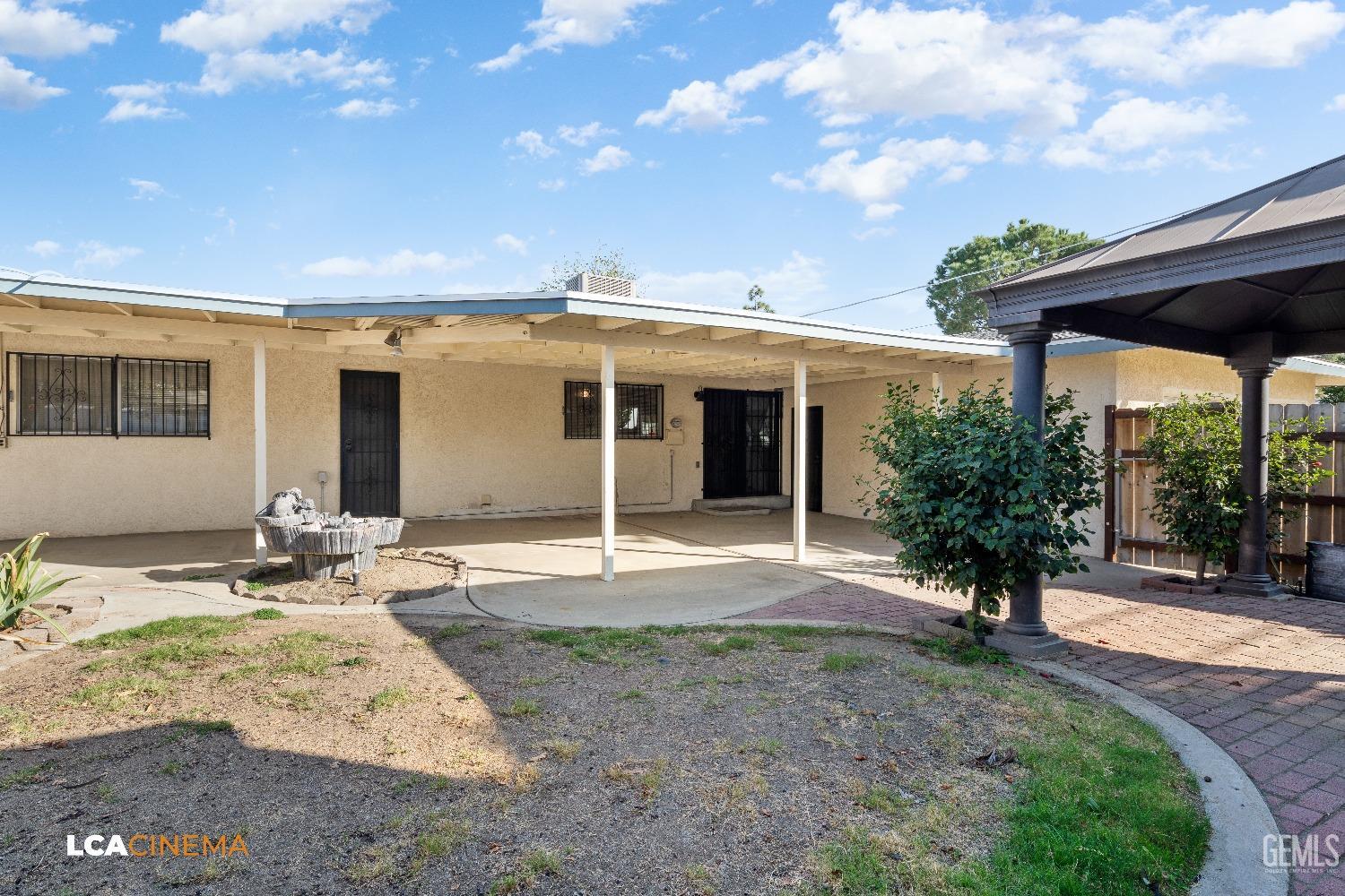 Undisclosed Address Bakersfield, CA 93306 - Photo 20 of 20 a view of a house with backyard and sitting area