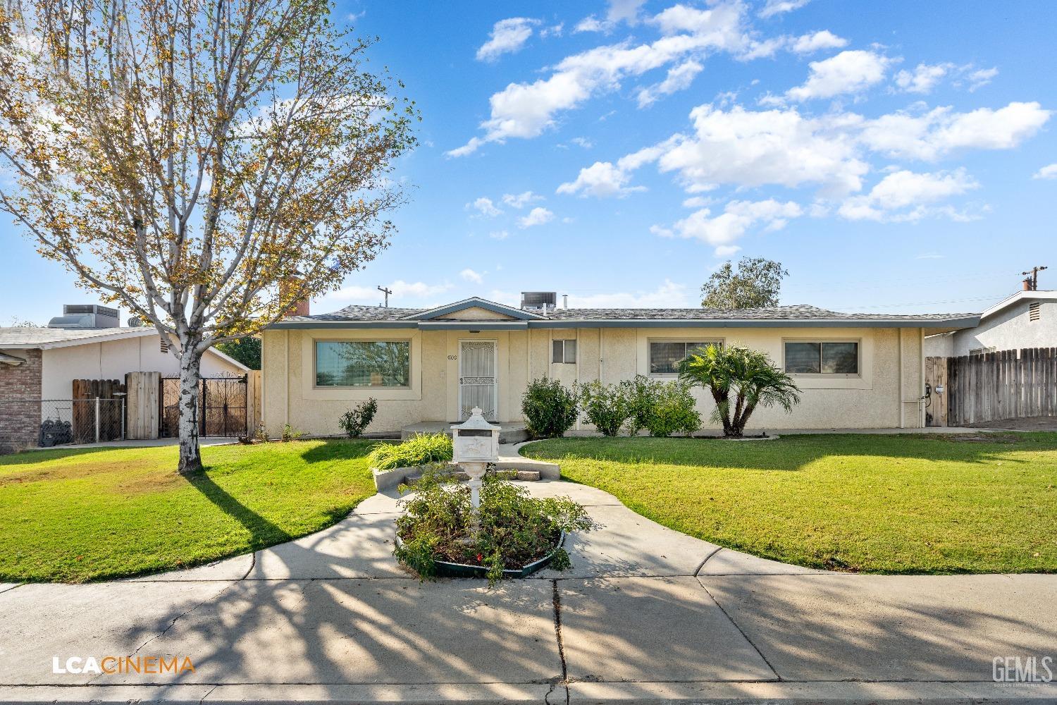 Undisclosed Address Bakersfield, CA 93306 - Photo 2 of 20 a view of a house with a swimming pool