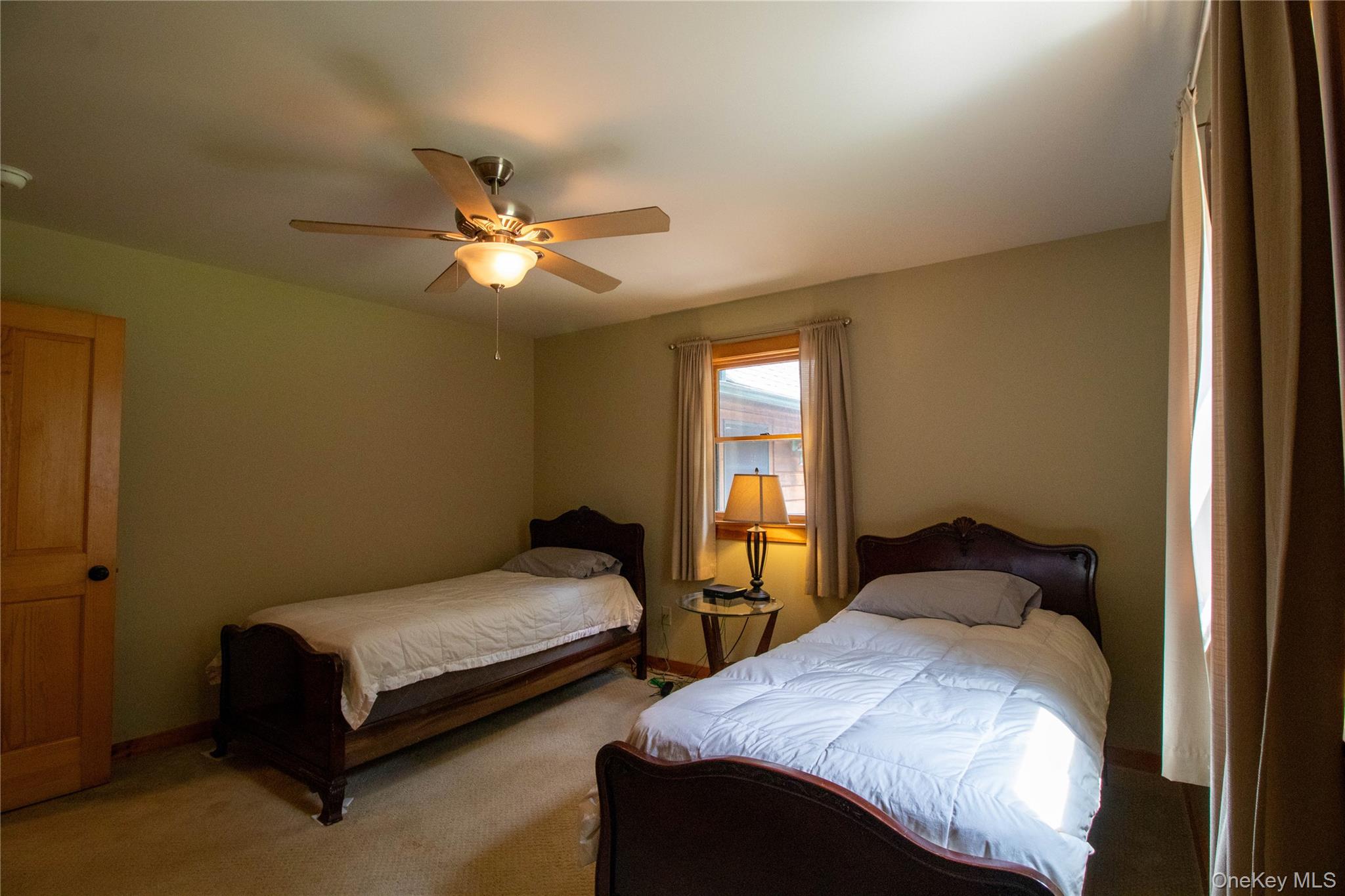 384 Morton Hill Road Roscoe, NY 12776 - Photo 20 of 27 Bedroom with carpet and ceiling fan