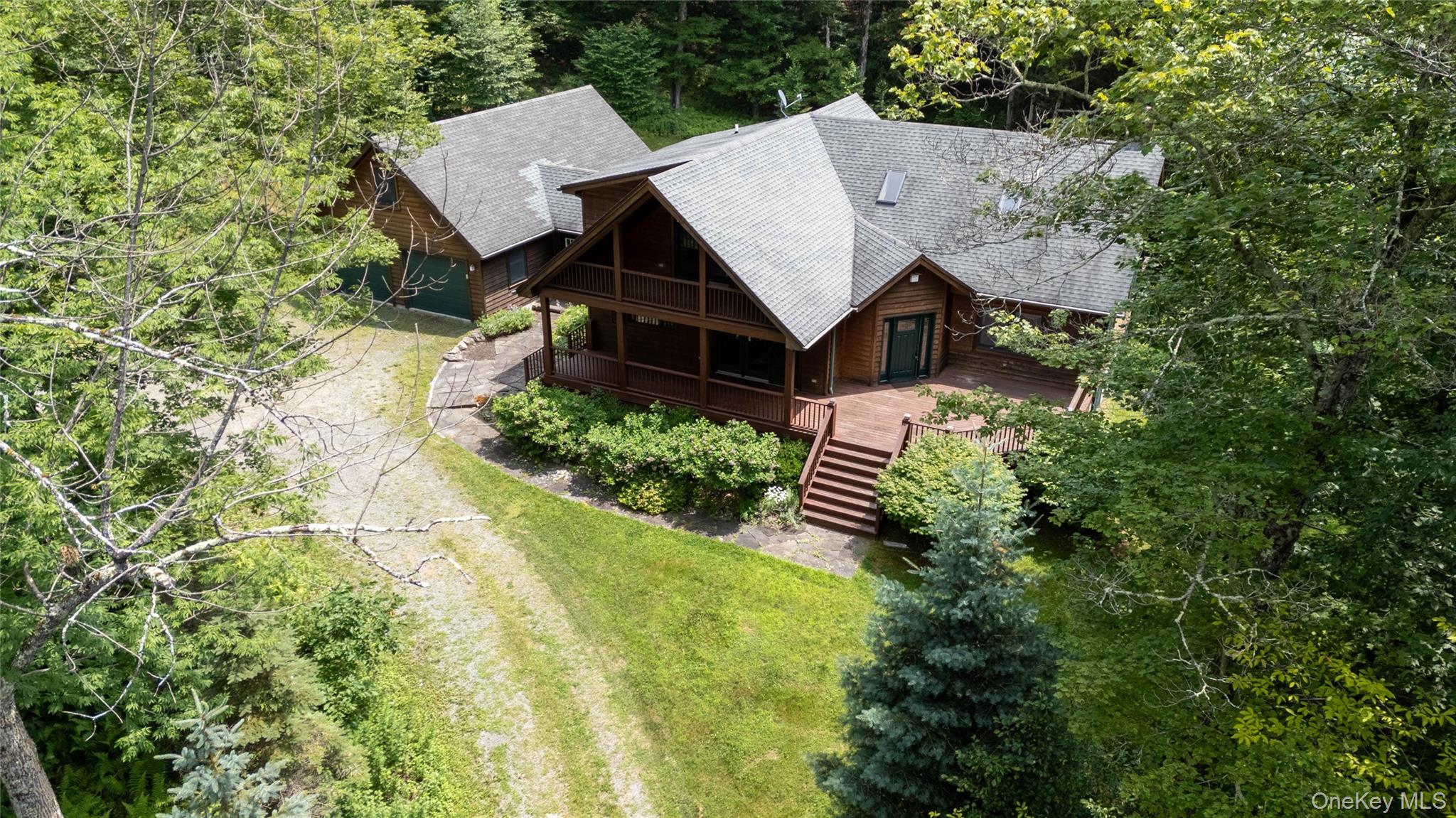 384 Morton Hill Road Roscoe, NY 12776 - Photo 7 of 27 View from above of property featuring a tree filled landscape