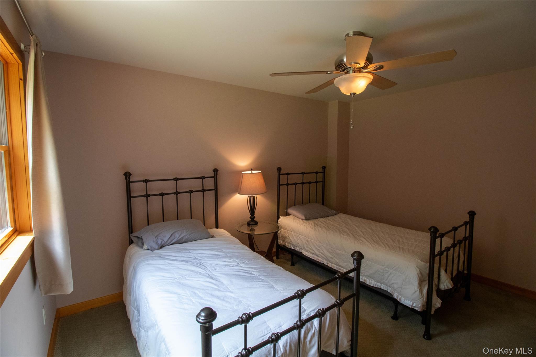 384 Morton Hill Road Roscoe, NY 12776 - Photo 10 of 27 Bedroom with a ceiling fan and carpet floors