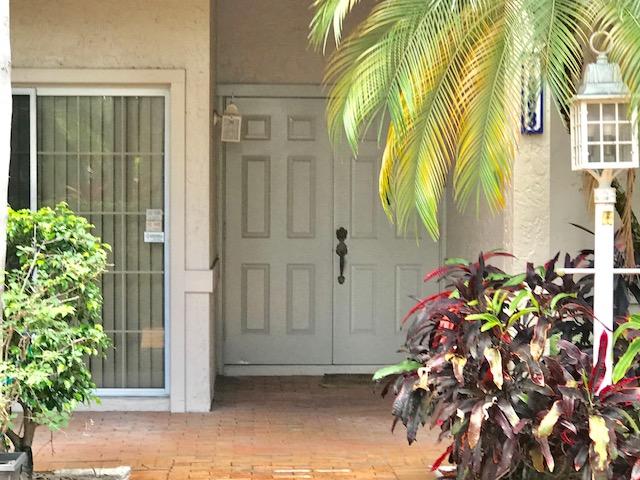 7663 Cinebar Drive Boca Raton, FL 33433 - Photo 2 of 26 1ST FLOOR UNIT WITH LOVELY ENTRANCE...
