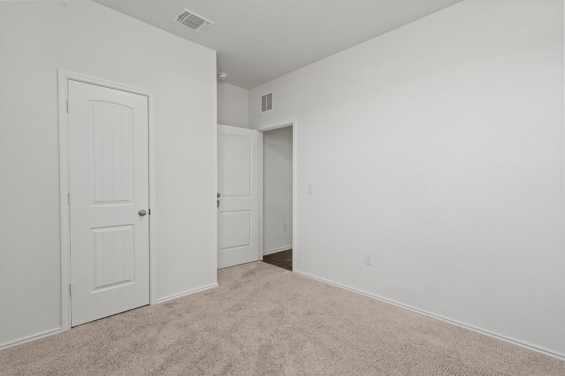 11908 Pyrite Road Manor, TX 78653 - Photo 13 of 35 a view of an empty room
