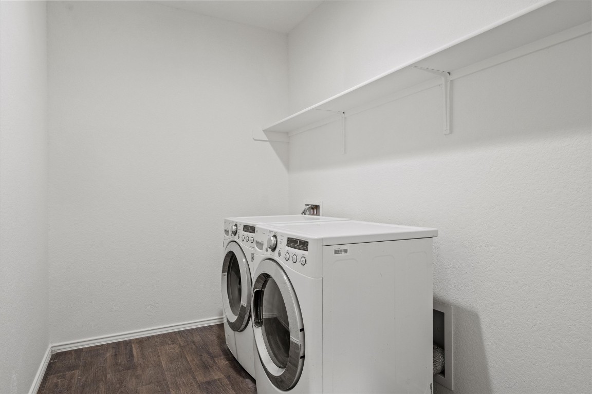 11908 Pyrite Road Manor, TX 78653 - Photo 17 of 35 a utility room with dryer and washer