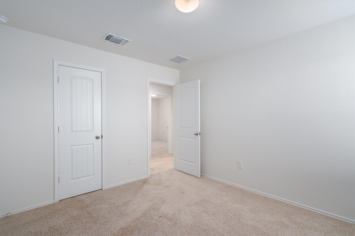 11908 Pyrite Road Manor, TX 78653 - Photo 29 of 35 a view of an empty room