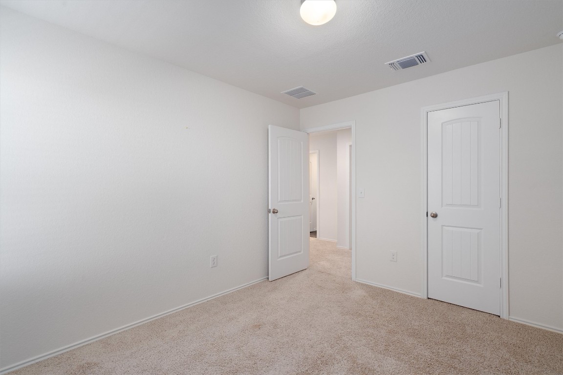 11908 Pyrite Road Manor, TX 78653 - Photo 31 of 35 a view of an empty room