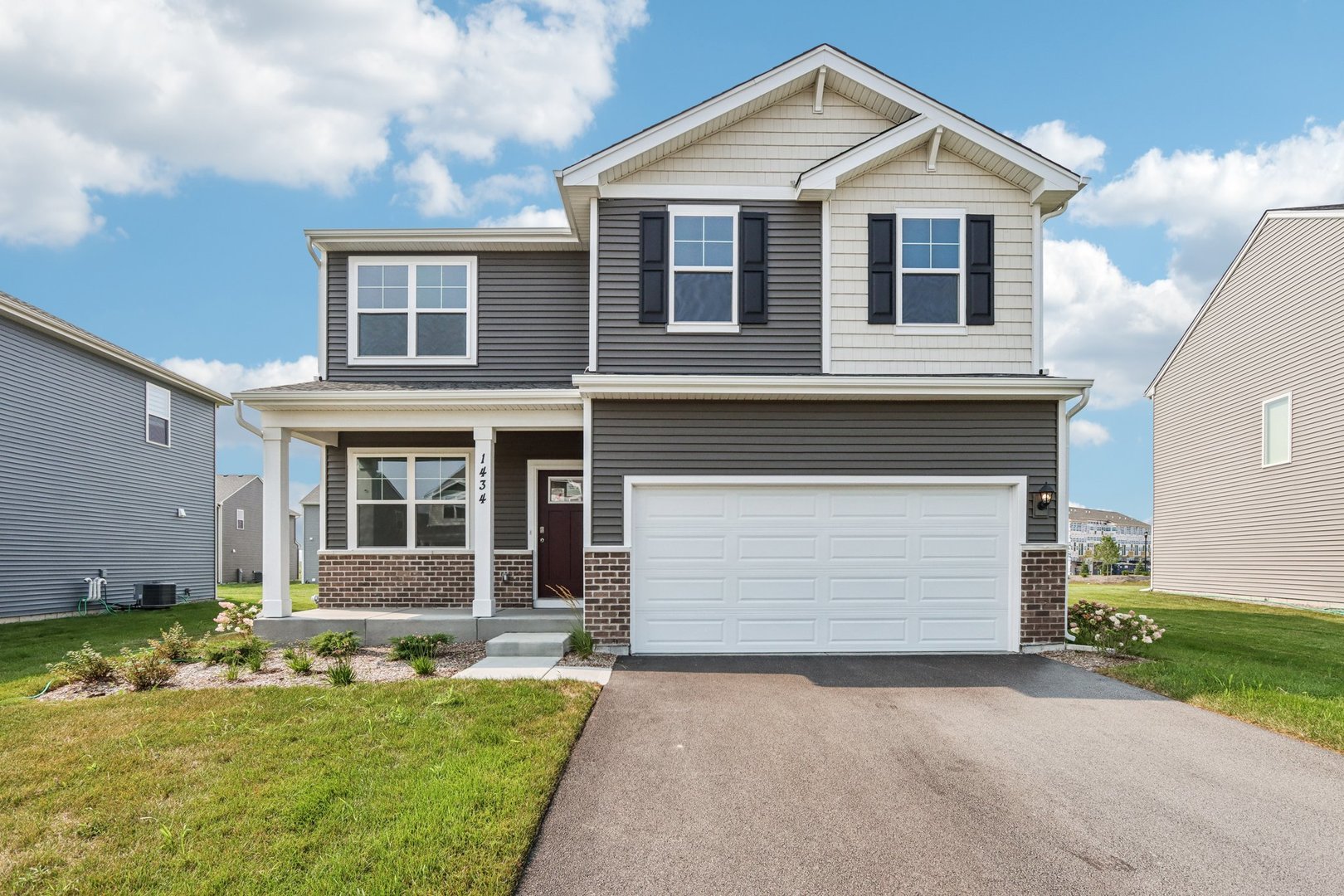 1552 Aspen Lane Pingree Grove, IL 60140 - Photo 1 of 73 a front view of a house with a yard and garage